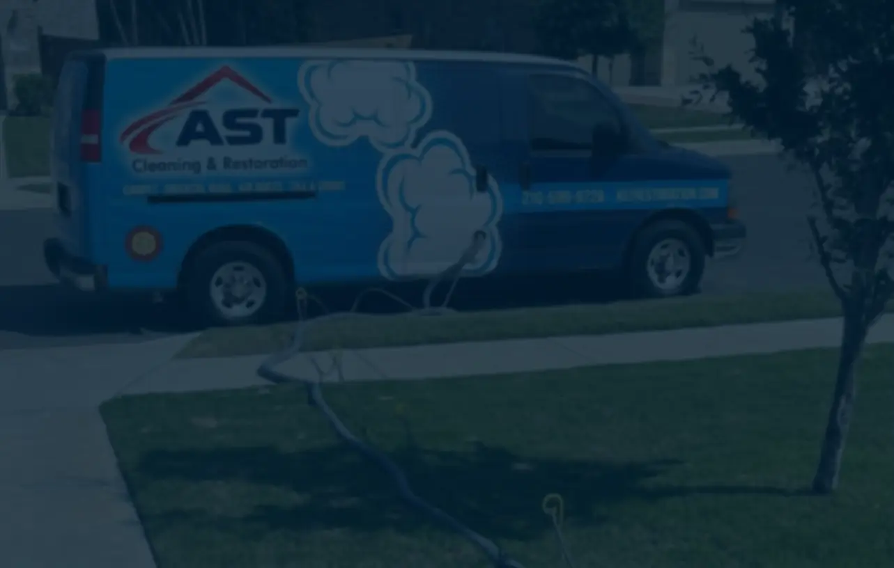 AST Cleaning & Restoration service van on location in San Antonio
